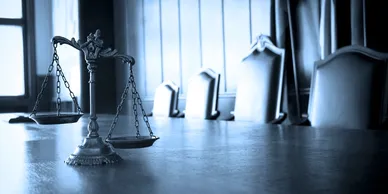 Scales of justice symbolizing appellate investigations and legal case reviews by private investigators.