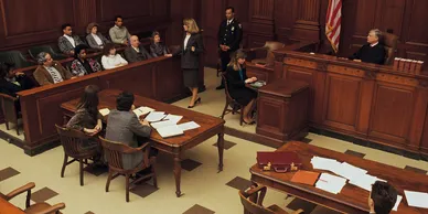 Courtroom scene representing criminal defense investigations to support legal defense strategies in court.